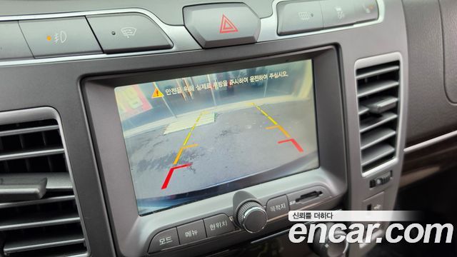 KG Mobility (SsangYong) Korando Turismo 4WD Chateau 11-seater 2014 — фото 16