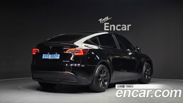 Tesla Model Y RWD 2024 — фото 2