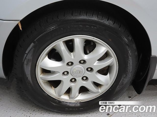 Kia Carnival R Grand Carnival GLX R Special 2011 — фото 5
