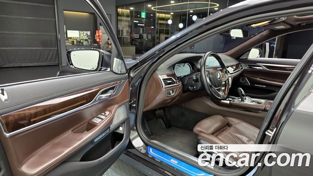 BMW 7 Series (G11) 750Li xDrive Premium 2016 — фото 11