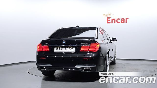 BMW 7 Series (F01) 750Li M Sports 2011 — фото 4