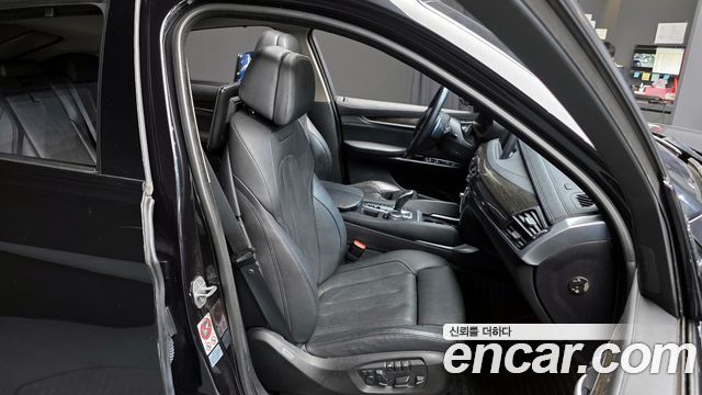 BMW X6 (F16) xDrive 40d 2016 — фото 12
