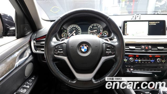 BMW X6 (F16) xDrive 40d 2016 — фото 13