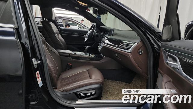 BMW 7 Series (G11) 730d xDrive M Sport 2017 — фото 11