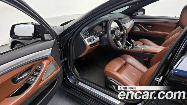 BMW 5 Series (F10) M550d xDrive 2014 — фото 11