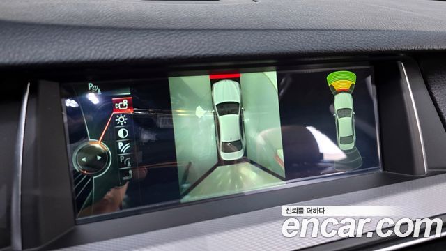 BMW 5 Series (F10) M550d xDrive 2014 — фото 16