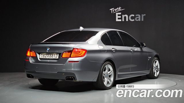 BMW 5 Series (F10) 550i xDrive 2012 — фото 2