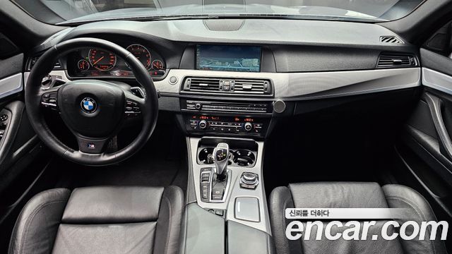 BMW 5 Series (F10) 550i xDrive 2012 — фото 7