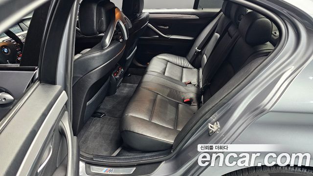BMW 5 Series (F10) 550i xDrive 2012 — фото 12