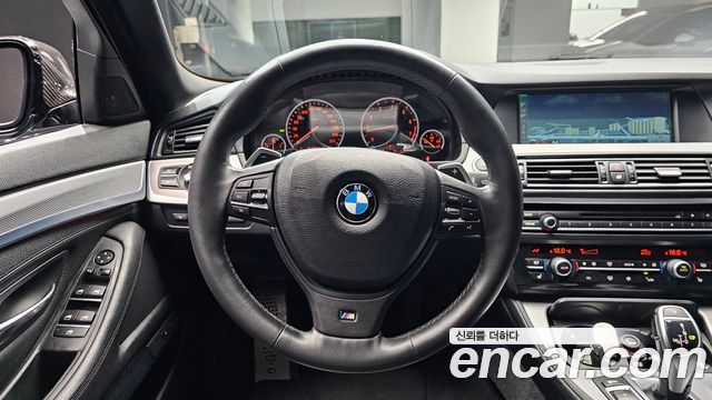 BMW 5 Series (F10) 550i xDrive 2012 — фото 14