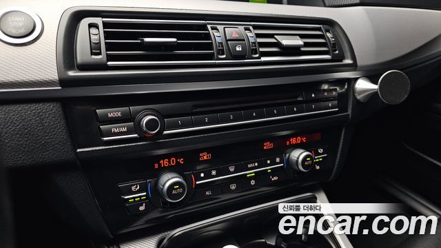 BMW 5 Series (F10) 550i xDrive 2012 — фото 17