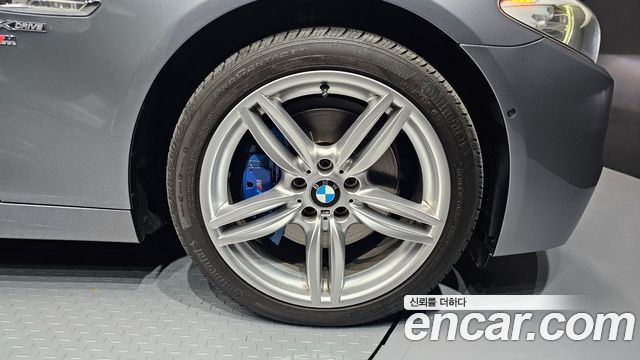 BMW 5 Series (F10) 550i xDrive 2012 — фото 21