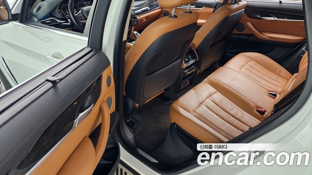 BMW X6 (F16) xDrive 30d 2018 — фото 12