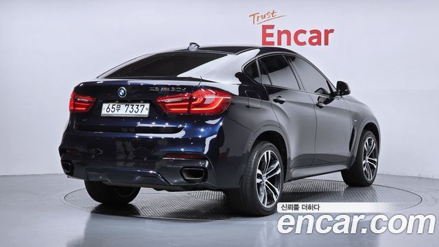BMW X6 (F16) M50d 2016 — фото 2