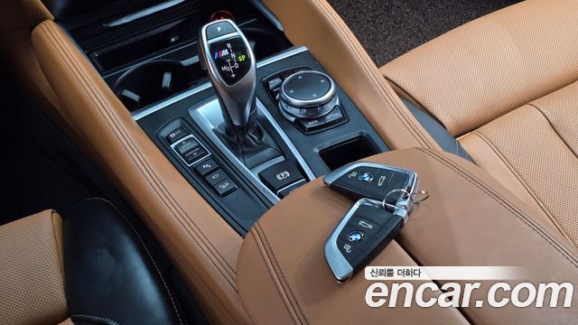 BMW X6 (F16) M50d 2016 — фото 9