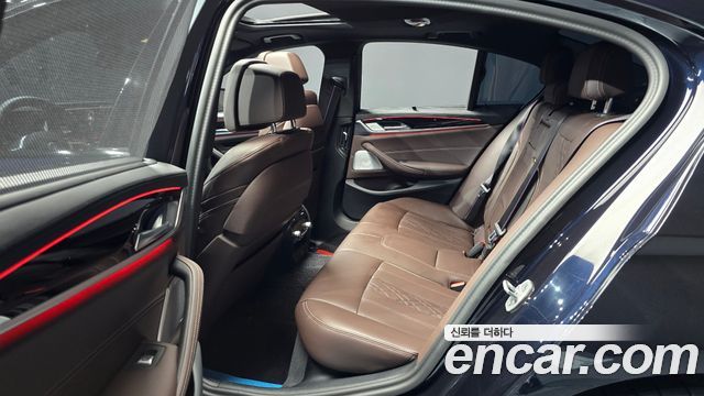 BMW 5 Series (G30) M550i xDrive 2023 — фото 11