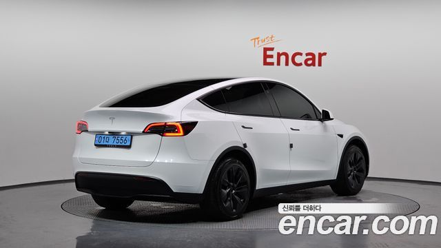 Tesla Model Y RWD 2024 — фото 2