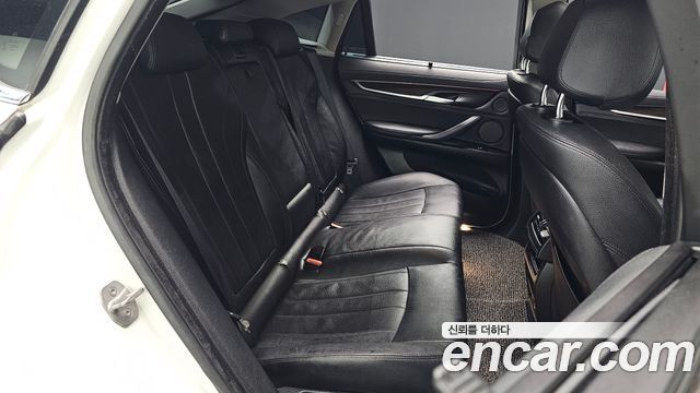 BMW X6 (F16) xDrive 30d 2015 — фото 11