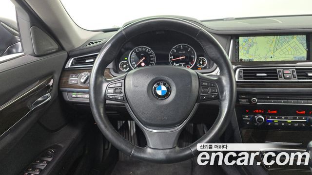 BMW 7 Series (F01) 730d xDrive 2014 — фото 13