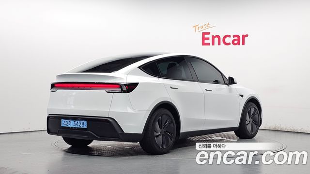 Tesla Model Y RWD 2025 — фото 3