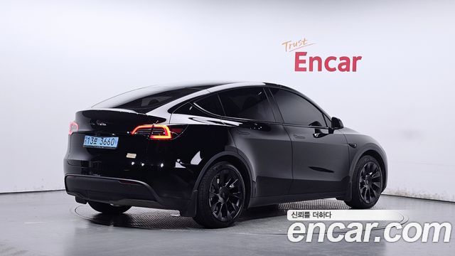 Tesla Model Y RWD 2024 — фото 2