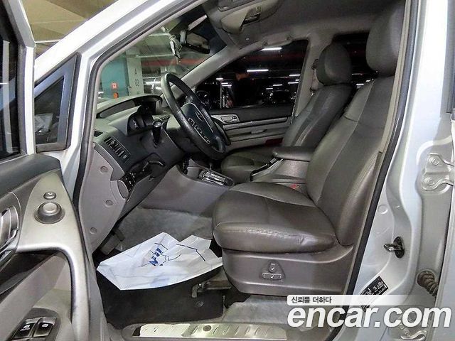 KG Mobility (SsangYong) Korando Turismo 4WD GT 9-seater 2014 — фото 7