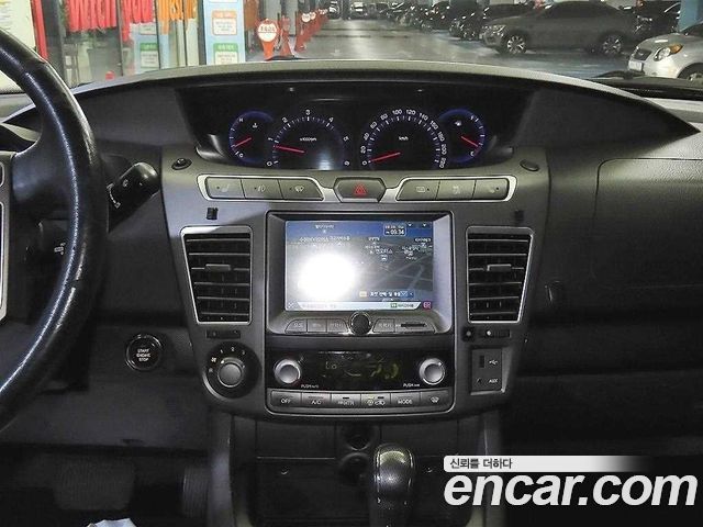 KG Mobility (SsangYong) Korando Turismo 4WD GT 9-seater 2014 — фото 11