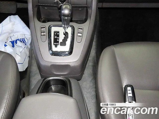 KG Mobility (SsangYong) Korando Turismo 4WD GT 9-seater 2014 — фото 12