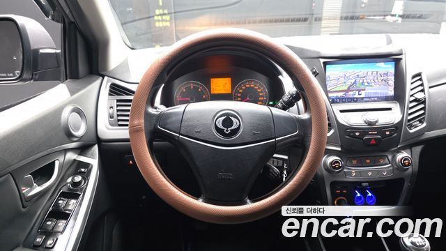 KG Mobility (SsangYong) Korando C 2.0 CVS 4WD Deluxe 2014 — фото 13