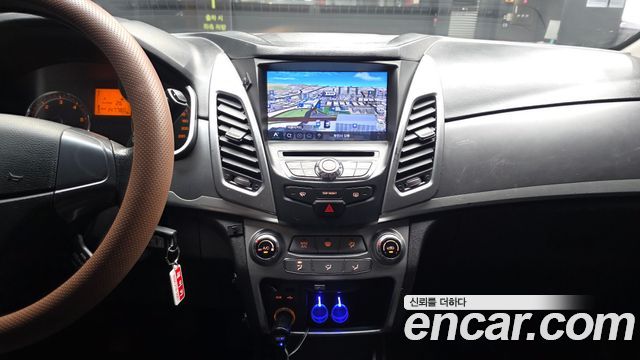 KG Mobility (SsangYong) Korando C 2.0 CVS 4WD Deluxe 2014 — фото 14