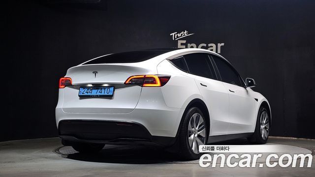 Tesla Model Y RWD 2024 — фото 2