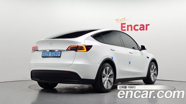 Tesla Model Y RWD 2024 — фото 2