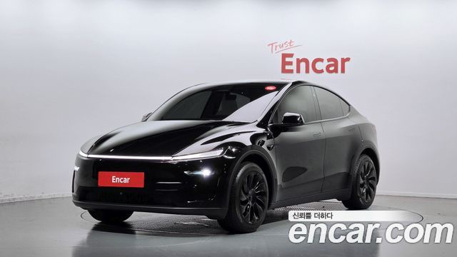 Tesla Model Y RWD 2025 — фото 1