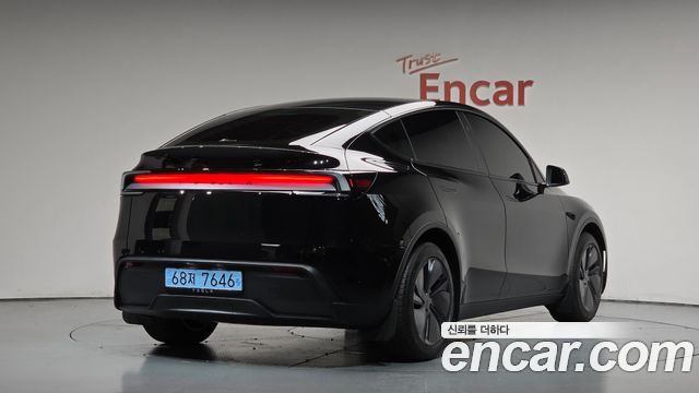 Tesla Model Y RWD 2025 — фото 2