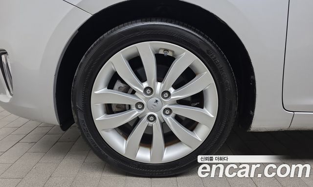 Kia Carens 2.0 LPi Luxury 2015 — фото 5