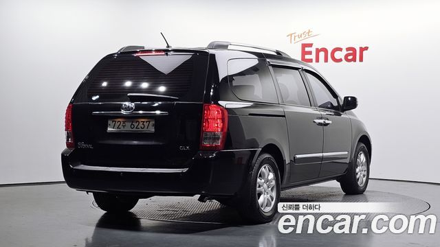 Kia Carnival R Grand Carnival GLX Luxury 2012 — фото 2