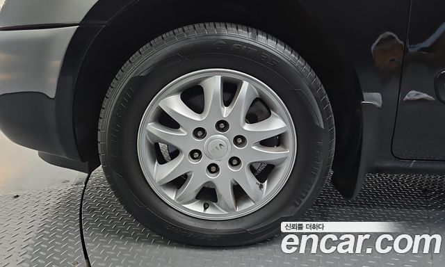 Kia Carnival R Grand Carnival GLX Luxury 2012 — фото 5