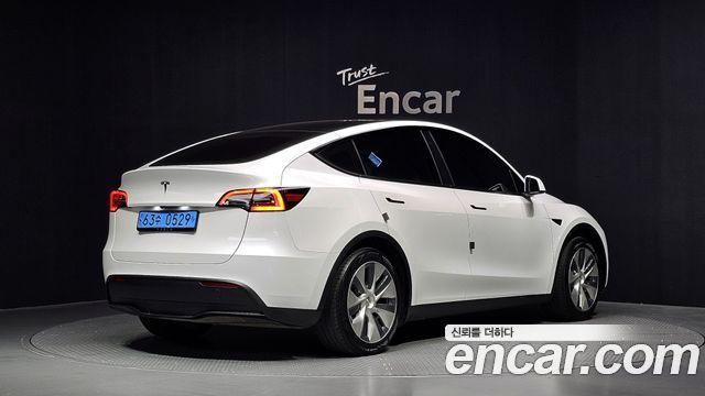 Tesla Model Y RWD 2024 — фото 2