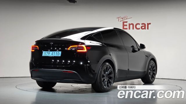 Tesla Model Y RWD 2024 — фото 2