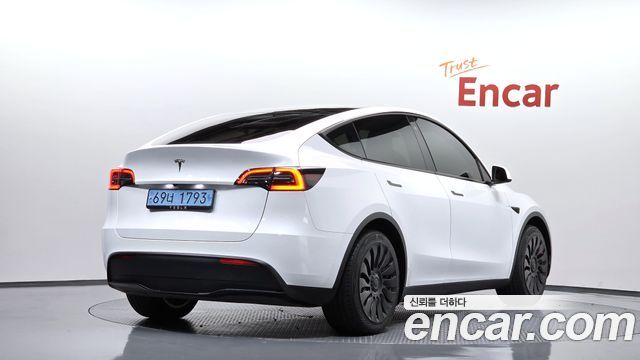 Tesla Model Y RWD 2024 — фото 2