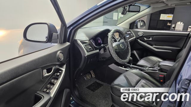 KG Mobility (SsangYong) Korando C 2.0 CVT 2WD Deluxe 2014 — фото 12