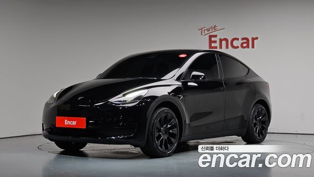 Tesla Model Y RWD 2025 — фото 1