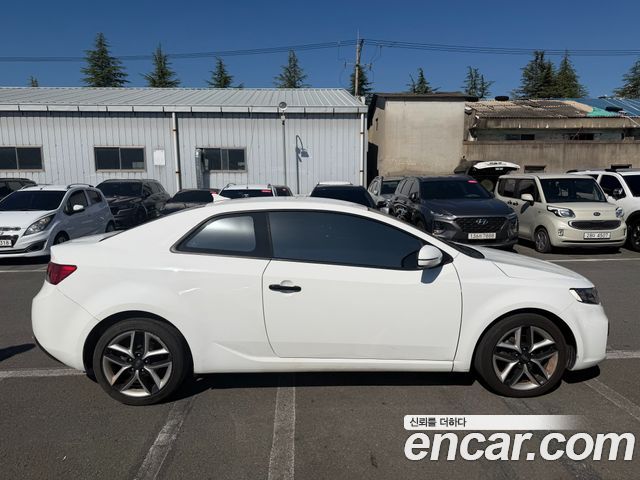 Kia Forte Koup 1.6 GDI Prestige 2012 — фото 15