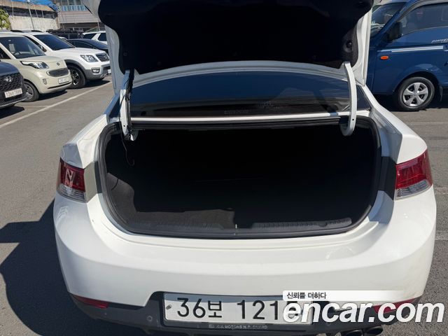 Kia Forte Koup 1.6 GDI Prestige 2012 — фото 16