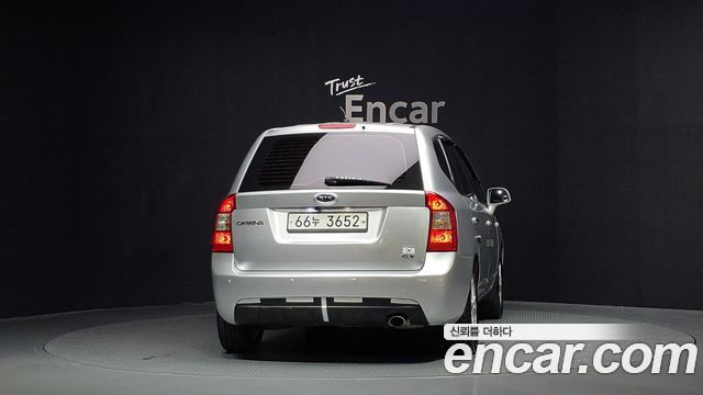 Kia Carens LPI 2.0 GX Deluxe 2011 — фото 4