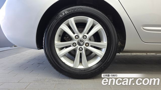 Kia Carens LPI 2.0 GX Deluxe 2011 — фото 5
