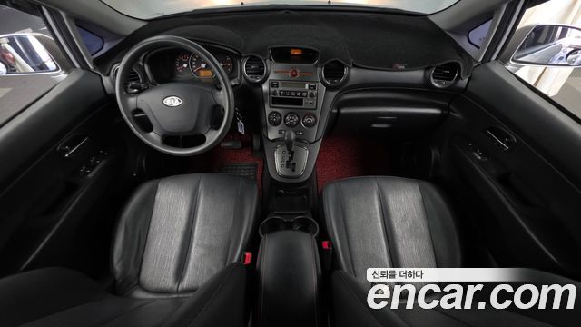 Kia Carens LPI 2.0 GX Deluxe 2011 — фото 7