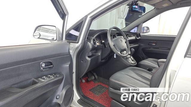 Kia Carens LPI 2.0 GX Deluxe 2011 — фото 10