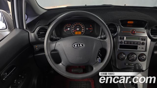 Kia Carens LPI 2.0 GX Deluxe 2011 — фото 17