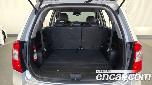 Kia Carens LPI 2.0 GX Deluxe 2011 — фото 24